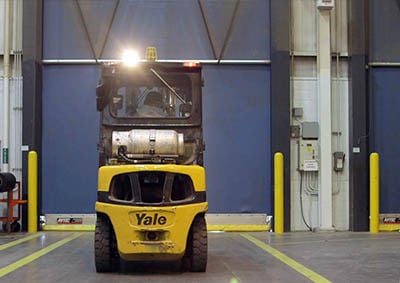Retrofitting facilities with high-performance fabric doors