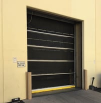 PredaDoor NXT screen door on warehouse