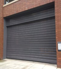 Spiral VT parking garage door on brick building