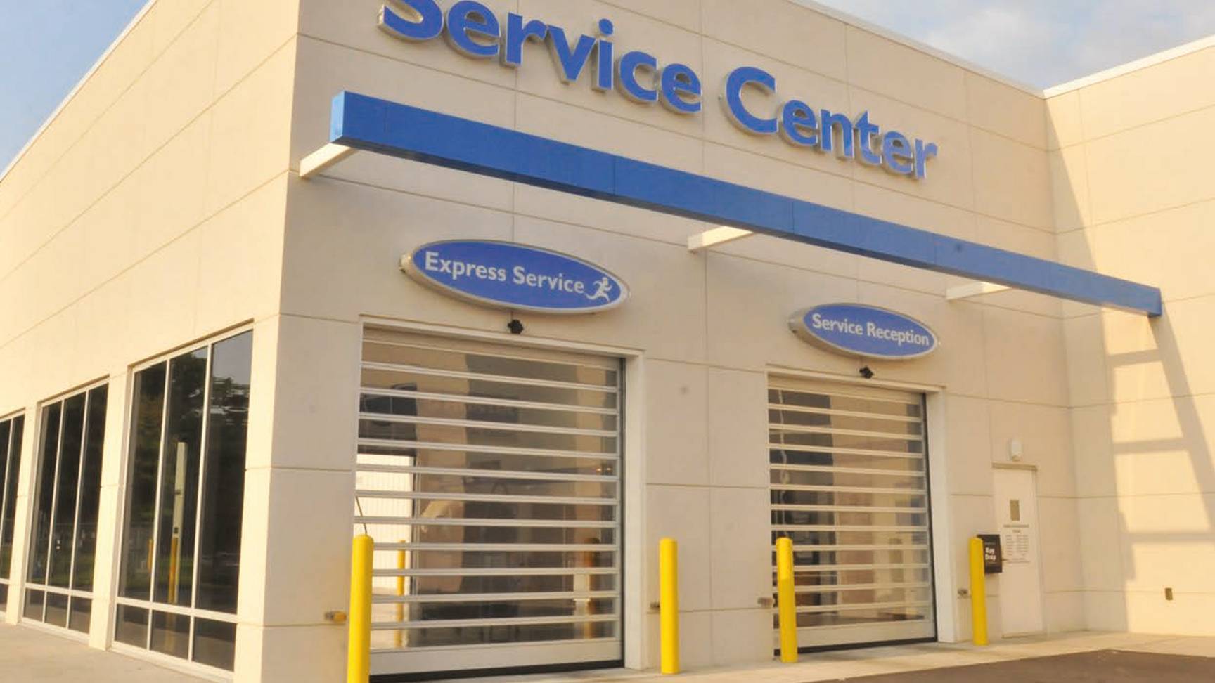 exterior of Delaney Honda building with two Rytec Spiral FV Doors