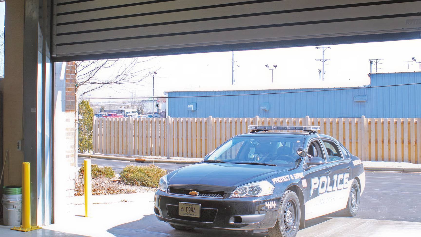 Rytec Spiral Door opening with police car coming in building
