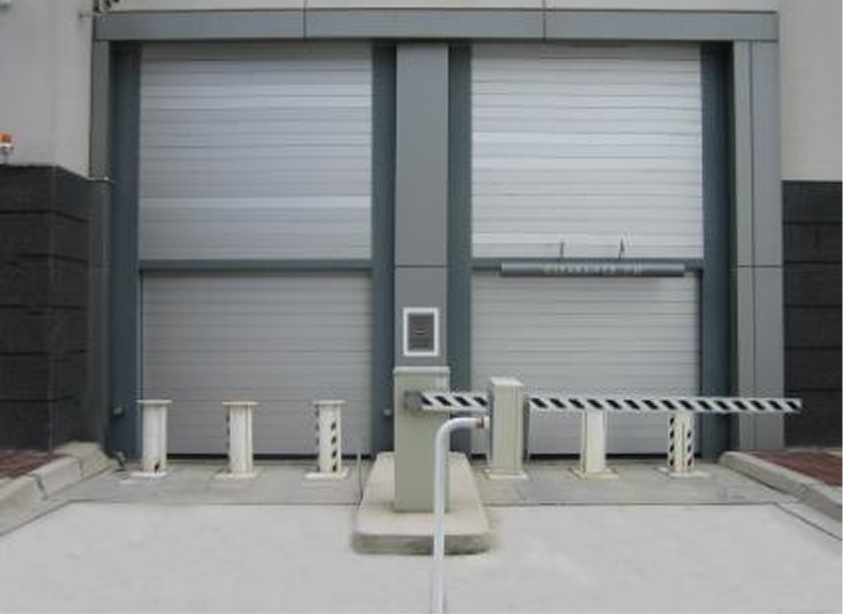 two doors with barriers