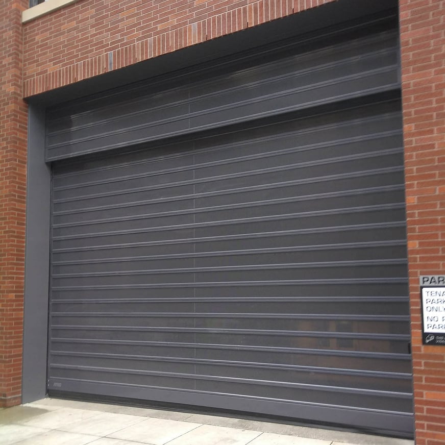 Spiral VT parking garage door on brick building