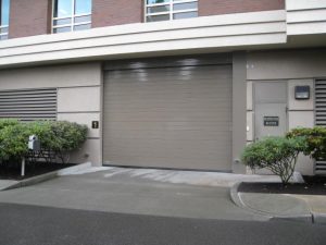 high speed parking garage door on building