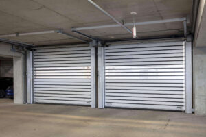 two closed spiral low headroom parking garage doors