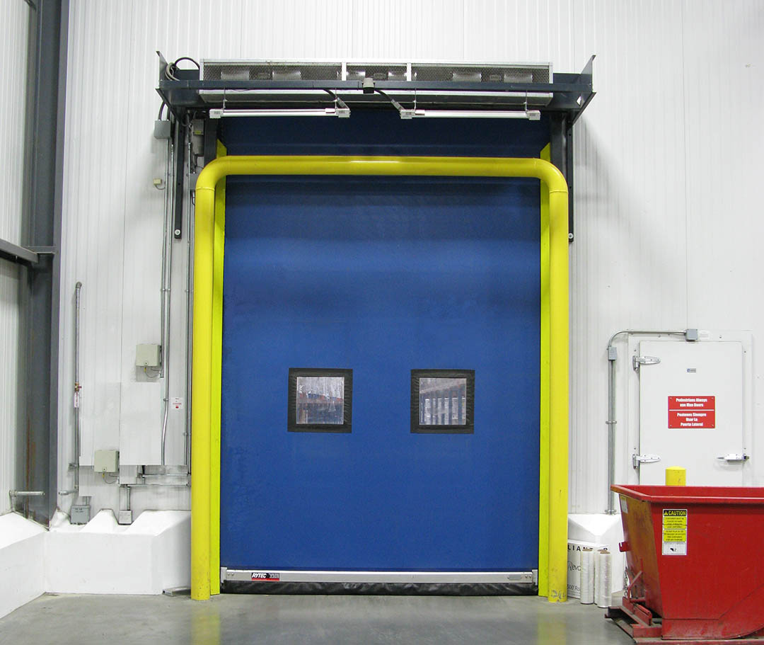 minimize frost build-up in cold storage environments - blue industrial door for cold storage