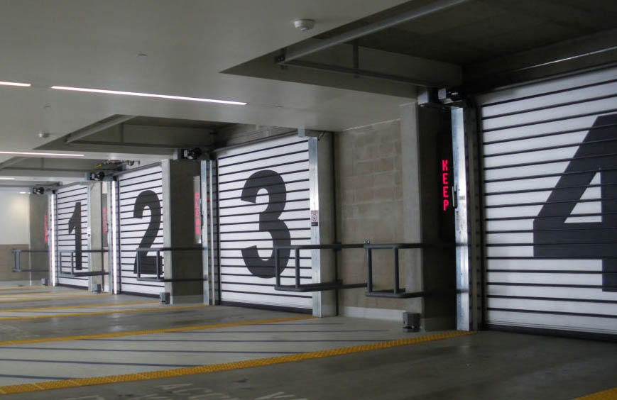 Automated parking structures (APS) and high-performance doors